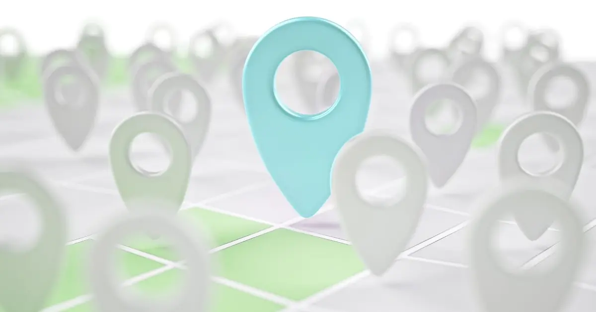 Teal map pin standing out among gray pins to mark a geofencing marketing boundary in Mobile and Baldwin County.
